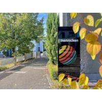 Schauwerbung Mennicken in Brand Stadt Aachen - Logo